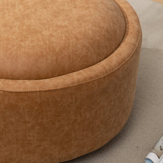 Savinien Upholstered Round Storage Ottoman