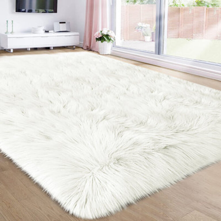 Heustis Machine-Woven Faux Sheepskin White Area Rug
