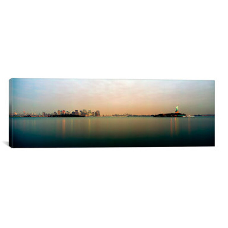 " River With The City Skyline And Statue Of Liberty In The Background, New York Harbor, New York City, New York State, USA " by Panoramic Images