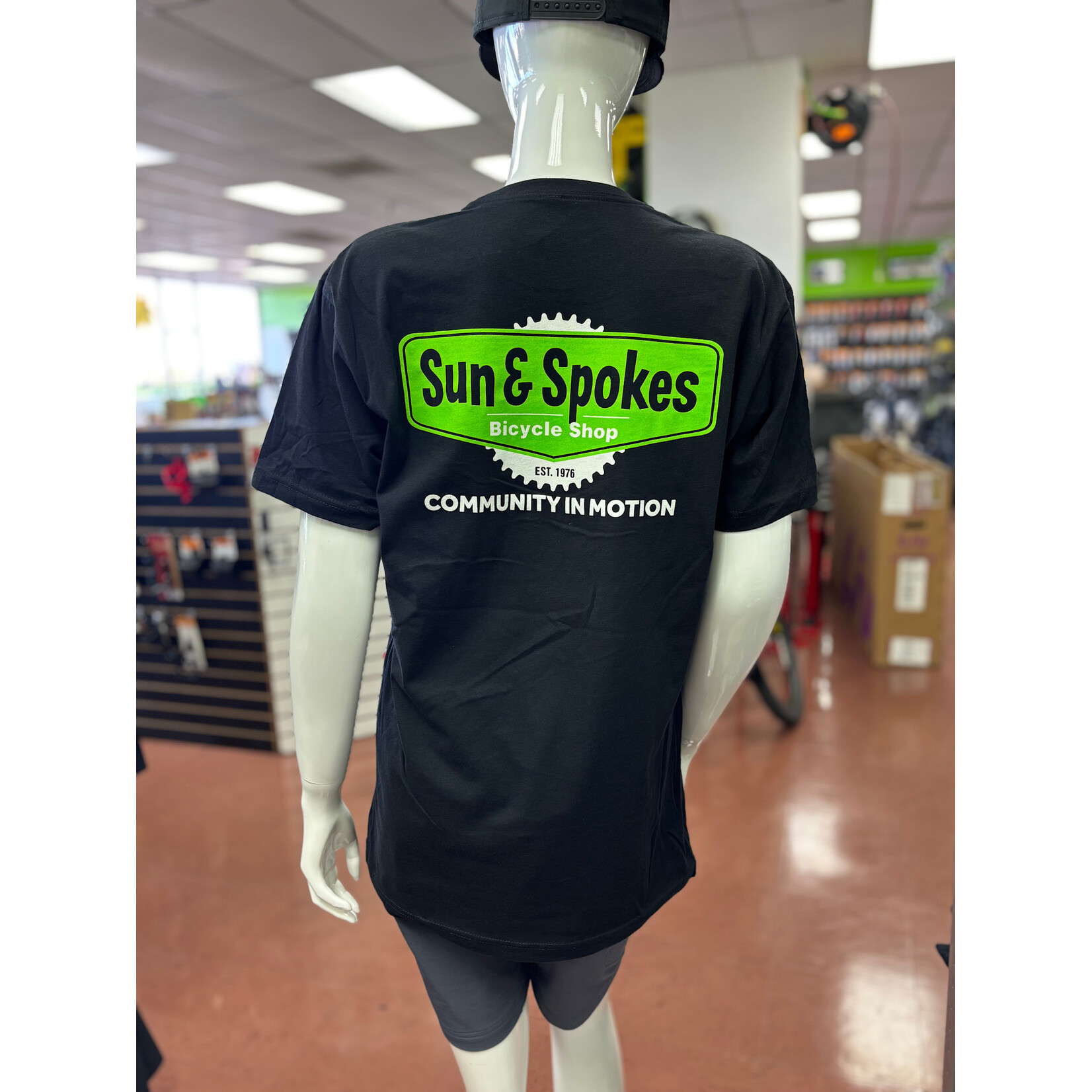 Sun & Spokes Bicycle Shop Sun & Spokes Shop T-Shirt 2026