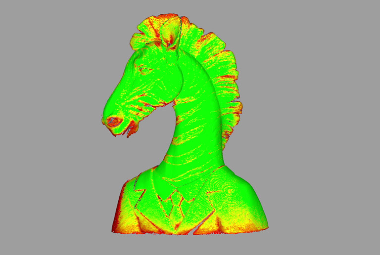 3D scan of a stuatue of a bust of a zebra in a costume. with a color map indicating which parts have enough data.