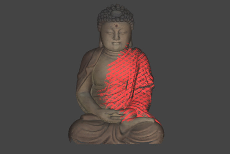 View in 3DeVOK Studio of a budda statue being scanned with red parts indicating parts that still need to be scanned more.