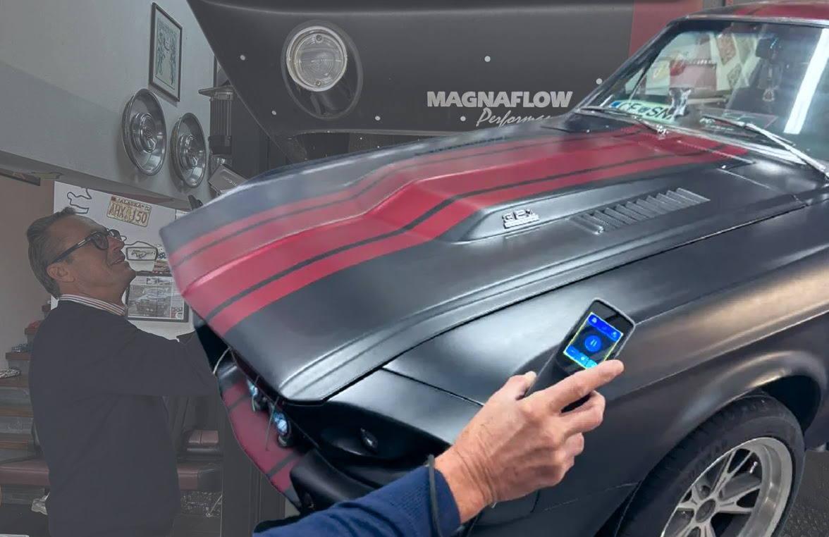 Hand holding the 3DeVOK MT while scanning the hood of a Shelby GT500CR car.