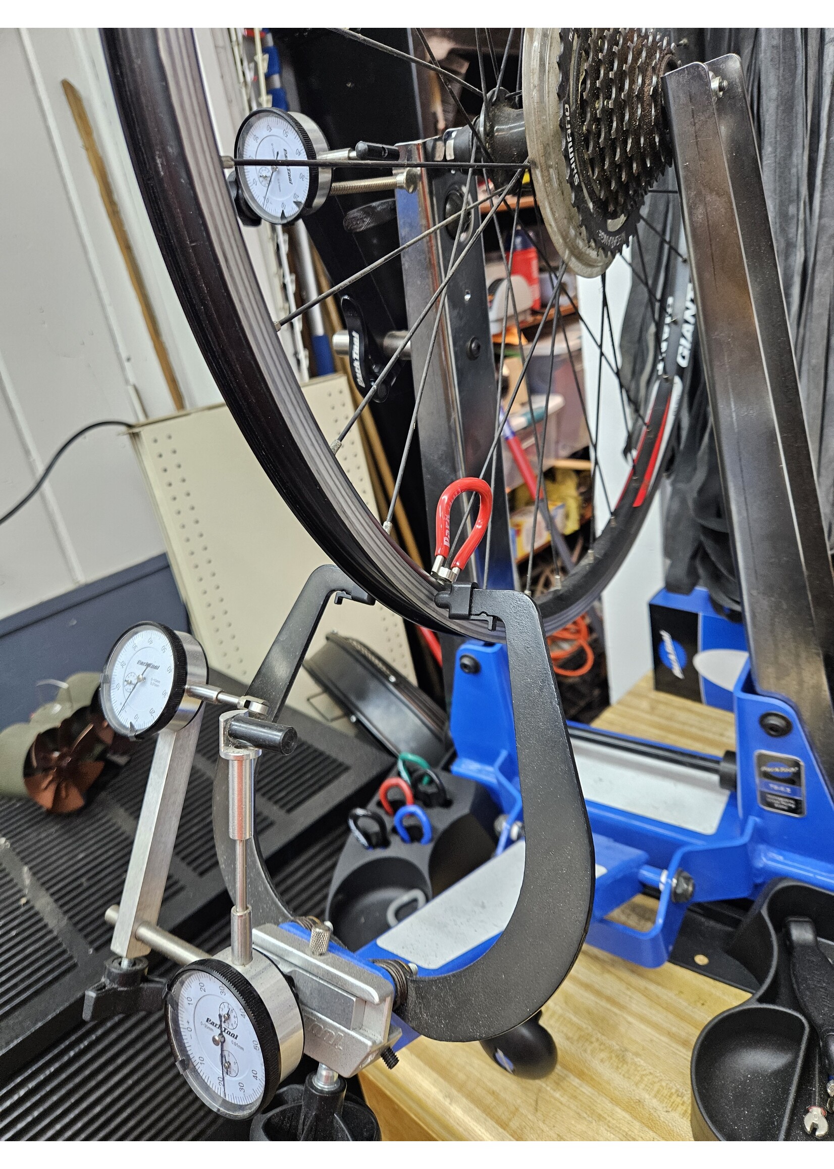 Wheel True (minor) w/Spoke Replacement