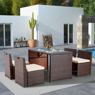 Yushin 4 - Person Wicker Patio Dining Set with Rectangular Table  Cushions Included