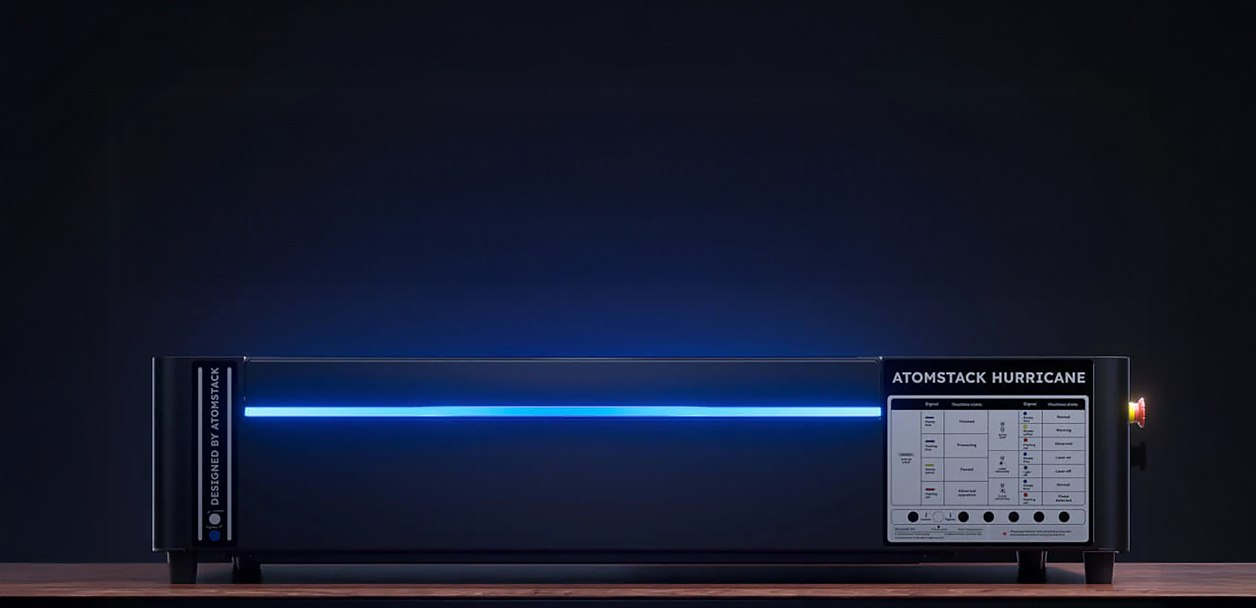 Frontal view of the AtomStack Hurricane on a wooden table against a black background.