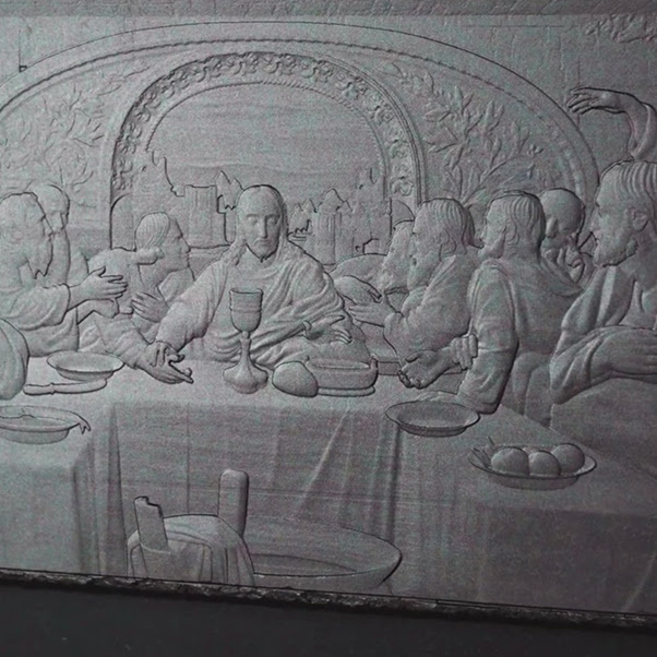 Slab of shale with a milled design of the last supper