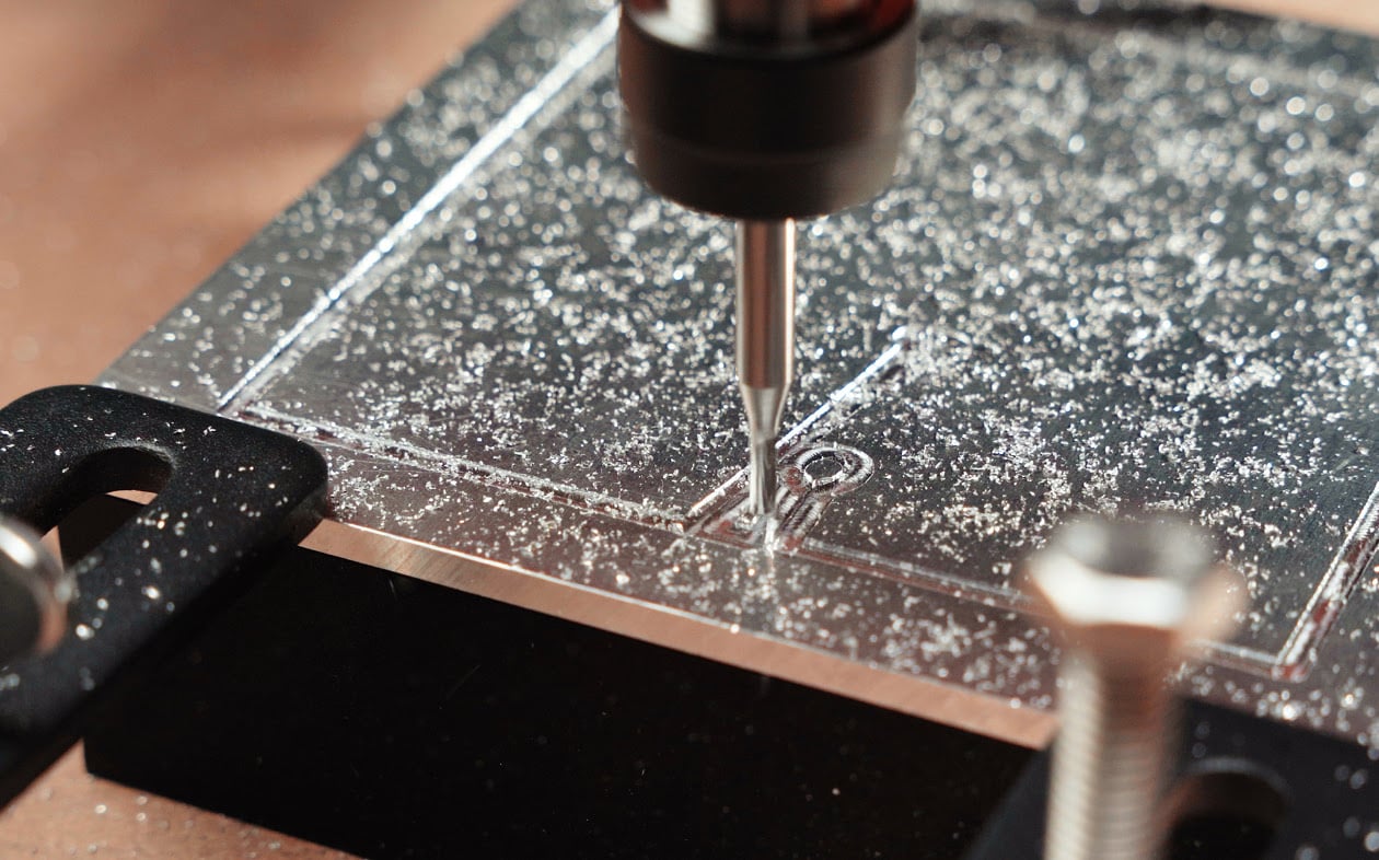 Close-up of a block of metal being milled