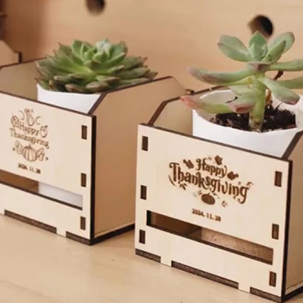Wooden lasercut trays with Happy Thanksgiving engraved on the side.