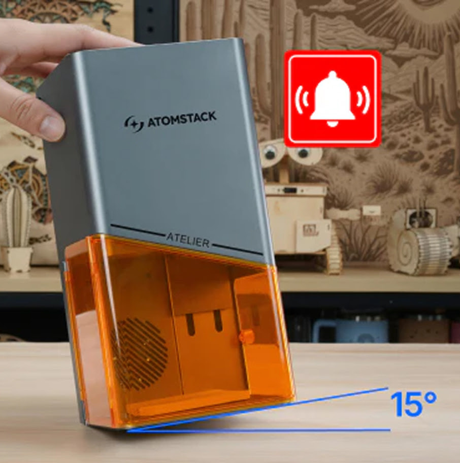 Hand tilting the AtomStack Atelier at 15 degrees.