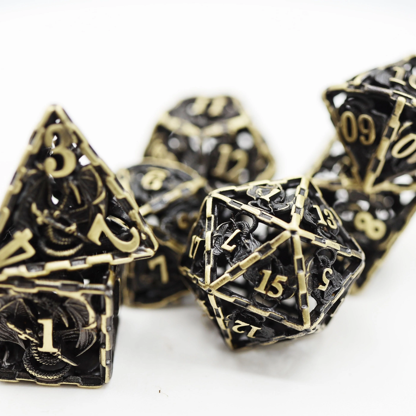 Foam Brain Games Bronze Chained Hollow Dragon Metal RPG dice 7 die set
