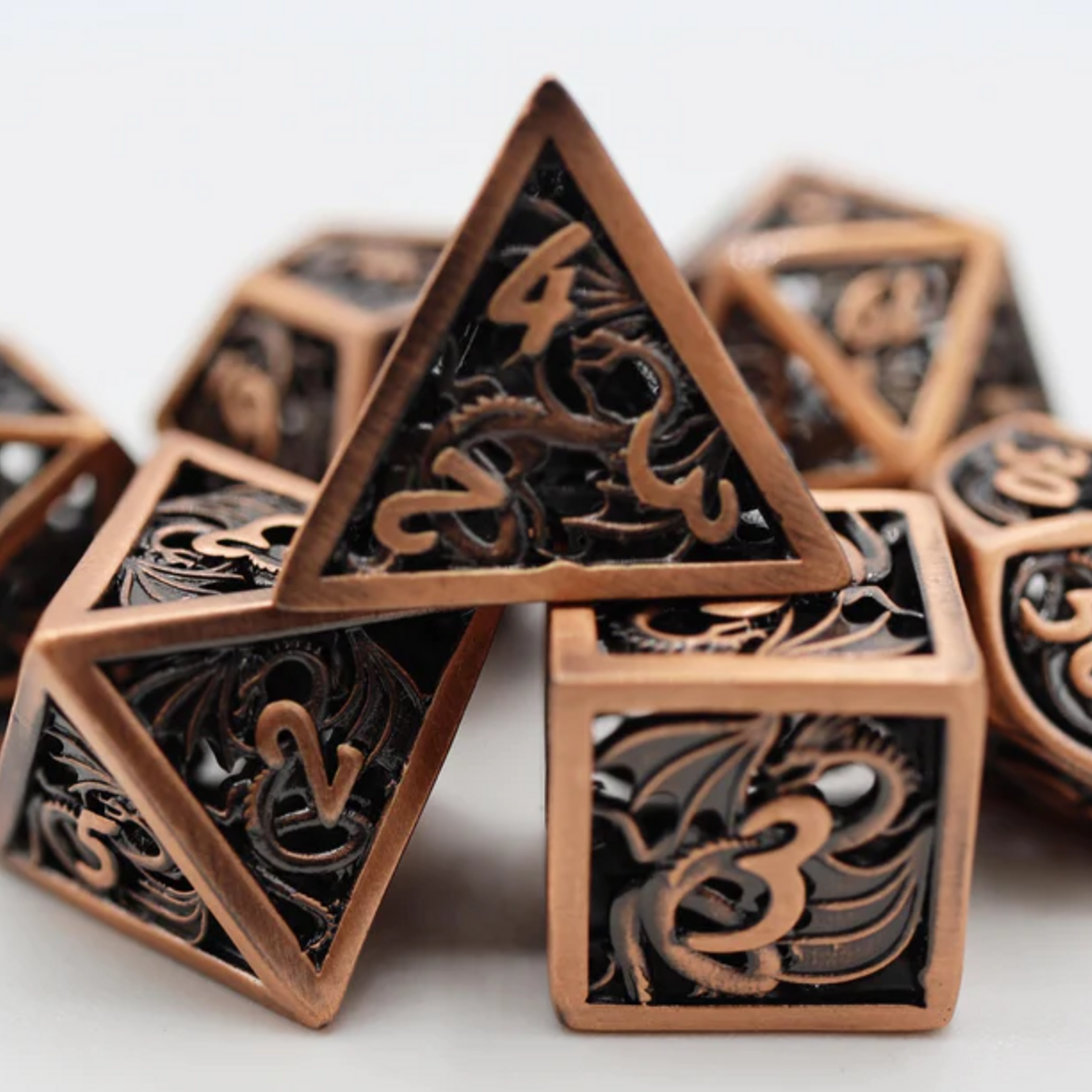 Foam Brain Games Dragon Essence Copper Hollow Metal Polyhedral 7 die set