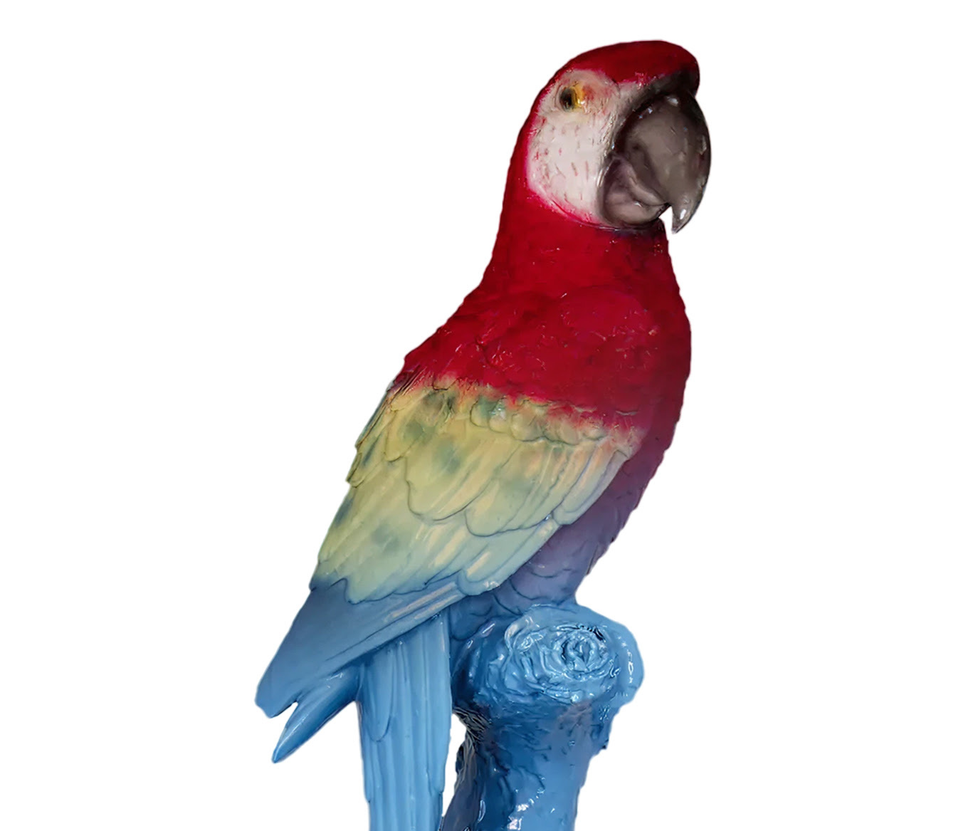 A colorful sculpture of a scarlet macaw parrot perched on a blue branch against a white background.