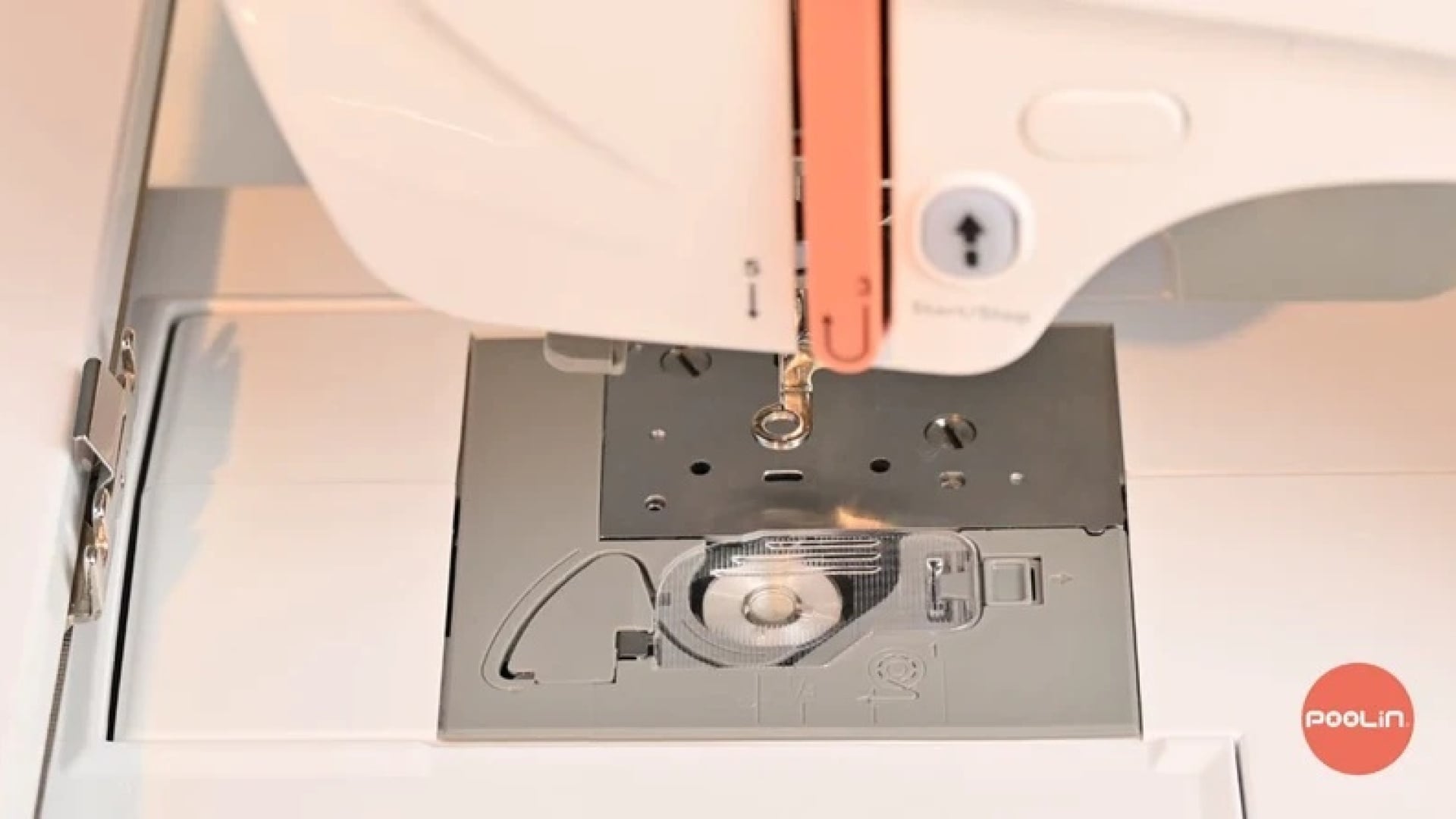 How to install a bobbin on a PooLin EOC03 or EOC05 embroidery machine